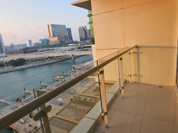 Sunset canal view from the balcony of a 3 bedroom apartment in Tala Tower, Al Reem Island
