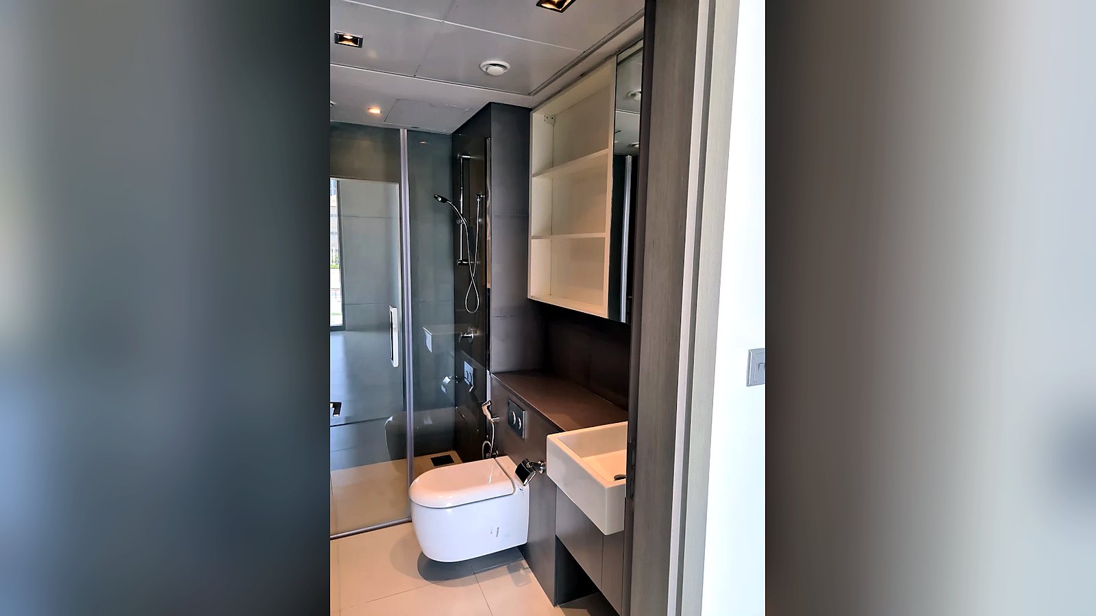 Ensuite bathroom with glass shower, Shams Meera apartment