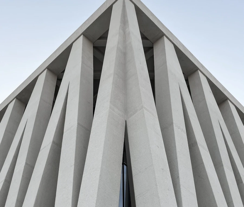 White concrete facade, modern architecture in Abu Dhabi